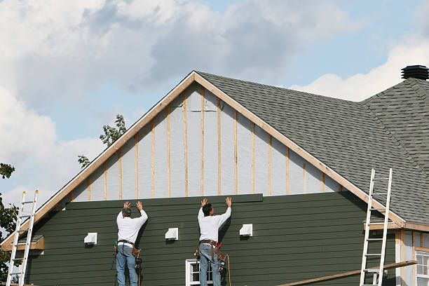 Professional Siding Installation technician working in Medina, TN